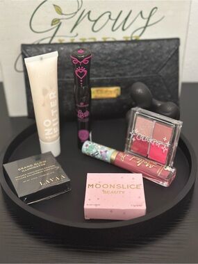 Makeup essentials (7 pieces) with pouch.